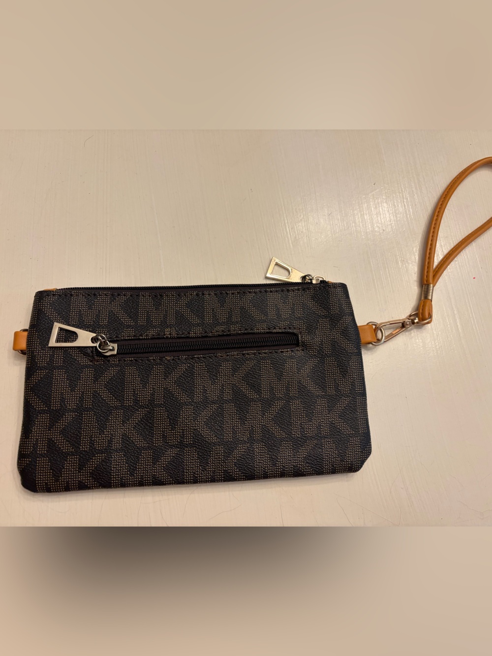Monogram Wristlet Clutch in Black and Tan